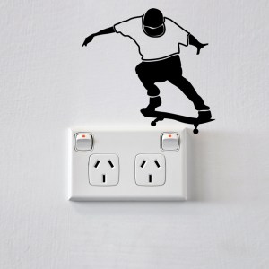 Skateboarder wall sticker for power points and light switches